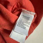 The North Face Emberglow Orange Never Stop Exploring Cropped Hooded Sweatshirt Photo 7