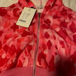 Size Small Pink Camouflage Zip Up Hoodie Photo 1