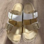 Birkenstock Women's Size 9 Arizona Split Birko-Flor sandal in white and gold Photo 1