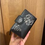 Coach Medium Corner Zip Wallet
Butterfly Print #CCL65 Photo 1