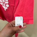 Free People NWT  FP Movement Inspire Logo T-Shirt in a pinkish graphic size XL Photo 3