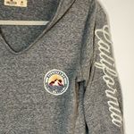 Hollister Embroidered "California" Long Sleeve Pull Over Hoodie Size Medium Photo 1