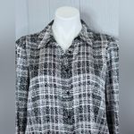 Elegant Women's Black and White Plaid Button Photo 1