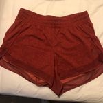 Athleta orange athletic shorts Photo 0