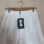 Pretty Little Thing Broiderie Anglaise Button Front Turn Up Hem Floaty Shorts Photo 3