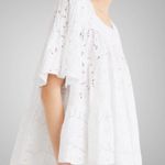 Like New Merlette Brandt Eyelet Tiered
Swing Blouse White Medium Retail $500.00 Photo 3