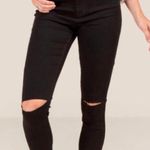 Francesca's Black Knee Slit Skinny Jeans Photo 0