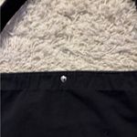 Minimalist Black Shoulder Bag with Crescent Shape Photo 3