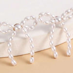 Elegant Pearl Bow Earrings White Photo 0