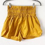 Free People  Movement The Way Home High Waisted Shorts in Gold Photo 2