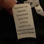 CAbi 629 Andy’s Skirt in Coal, NWT Photo 9