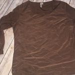 Susan Lawrence  brown blouse Photo 1