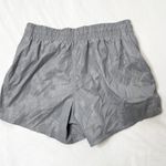 Athleta  Hustle Run Racer Light Gray Camo Shorts Photo 1