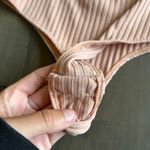 Showpo Staring Back At You Bodysuit in Blush Photo 1