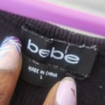 Bebe ribbed ruched sides dress studded in black and multi-colors size large. Photo 10