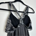 Lululemon  Rest Less Tank in Heathered Black and Flowabunga Black Angel Wing. Photo 7