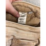 risen tan flare jeans raw hem 28 stretch distressed spots shown on leg Brown Photo 4
