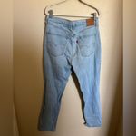 Levi's 70s high slim straight light jeans size 32 light wash Photo 6