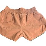 Lululemon  Choose a Side Short Reversible 3" Zip Pocket Teal/mauve size 4 Photo 2