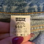 Levi's Vintage Levi’s 550 Relaxed Fit in Medium Wash Photo 4