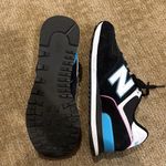 New Balance  Black and White Sneakers with Pink Accents Photo 3