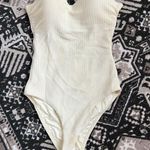 One Piece  Swimsuit Photo 0