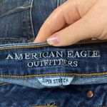 American Eagle  Super Stretch denim midi cuffed shorts with distressed hem size 4 Photo 6
