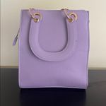 Trina Turk double handle tote in lilac with a removable crossbody strap Photo 6