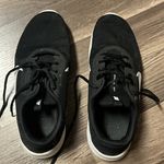 Nike black  tennis shoes Photo 1