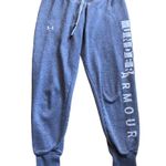 Under Armour Womens grey sweatpants, drawstring waist, logo down side of pants, excellent condition, size small Measurements: Waist: side to side 15 inches Inseam: 28 inches Photo 0