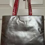 Clinique  Women's Silver Tote Bag Peppermint Swirl Pattern Inside Tote Red Handle Photo 0