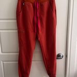 FIGS  Orange and Pink Jogger Pants Photo 0