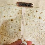 Free People cream colored slouchy turtleneck high low hem Skyscraper sweater. S Photo 8