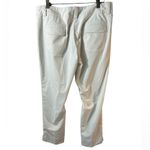 Nike  Women’s Dri-Fit White Golf Pants. size 12. zippered side pkts. EUC Photo 1