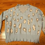 Unbranded women’s baby blue and pink Cheetah Print v V Photo 0