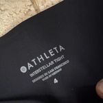 Athleta  size 4 black and white interstellar tight side zipper no flaws Photo 3