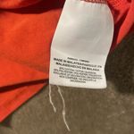 Nike  SB Tshirt Women's Size Small Orange Logo Spellout Short Sleeve Top Photo 3