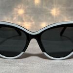Boutique White and black sunglasses  Photo 0