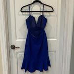 Q&A Brand: 
Size: XS
Color: Navy Blue
*Worn once to a black tie wedding* Photo 2