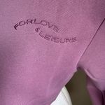 For Love & Lemons NWT Josie Cropped
Crewneck Pullover Sweatshirt in Lilac Photo 5