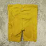 Athleta Ultimate Stash Pocket 7" Shorts Yellow Mustard High Rise Bike size XS Photo 3
