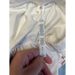 FILA Tennis Skirt Pleated Athletic Skort White Yellow Black Trim Women's Size S Photo 2