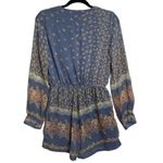 The Hanger  Floral Romper Size Medium Baby Blue Long Sleeve Pockets Floral Shorts Photo 4