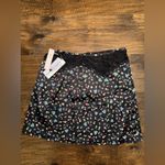 For Love & Lemons NWT  x VS
COLLECTION LUCY BLACK FLORAL SKIRT SIZE SMALL Photo 1