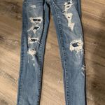 American Eagle Outfitters Distressed Denim Skinnies Blue Size 00 Photo 0