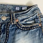 Miss Me  Irene bootcut jeans Medium wash Distressed in areas Size 28 Flap pockets Photo 5