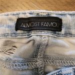 Almost Famous acid wash super distressed skinny jeans size 0 Photo 2