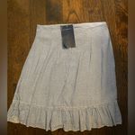 Brandy Melville  floral mini skirt Photo 1