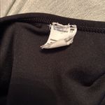 Nike  Women's Classic Dri Fit Black Sports Bra with White Logo Photo 5