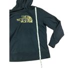 The North Face black hoodie with gold graphic size medium Photo 4
